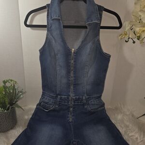 BEBE Denim Blue Romper Zipper Front. Size SMALL